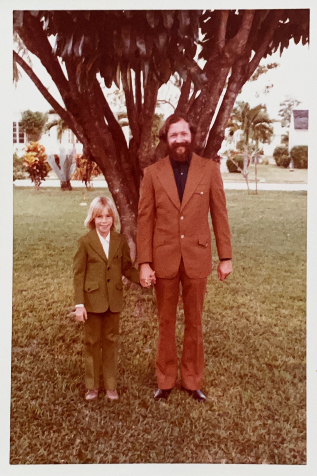 Adult and child outdoors